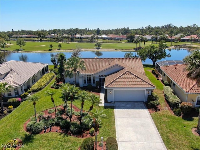 bird's eye view with a water view