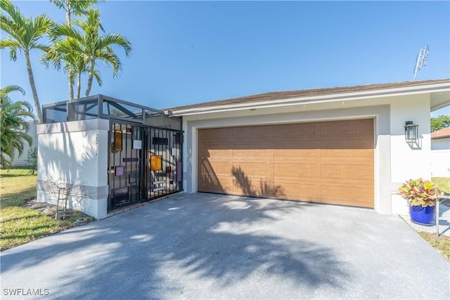 garage with driveway