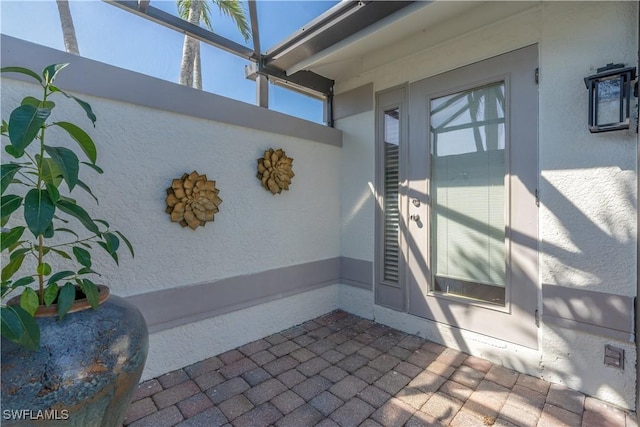 2237 Kings Lake Blvd, Naples, FL 34112 - view of exterior entry with stucco siding