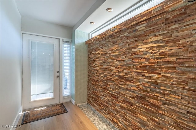 foyer with wood finished floors