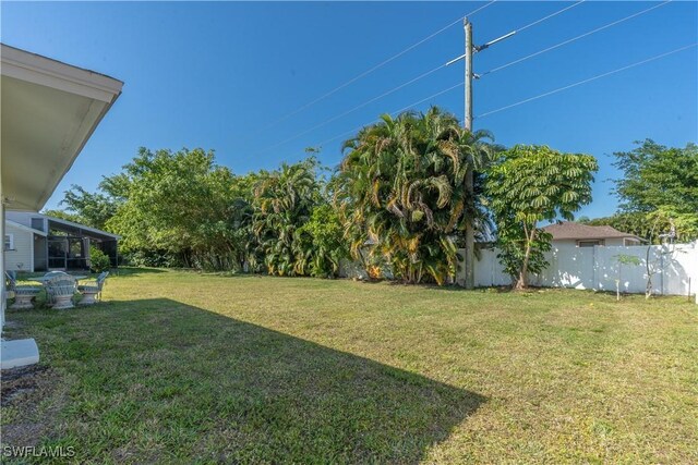 view of yard featuring fence