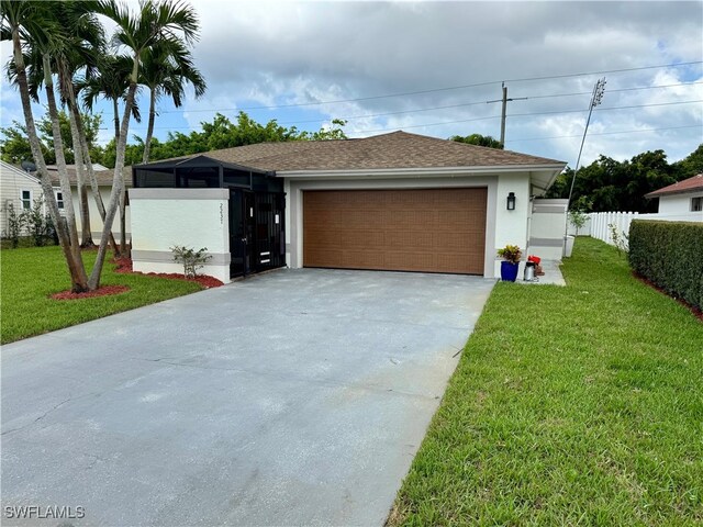 2237 Kings Lake Blvd, Naples, FL 34112 - view of front of property with stucco siding and a shingled roof