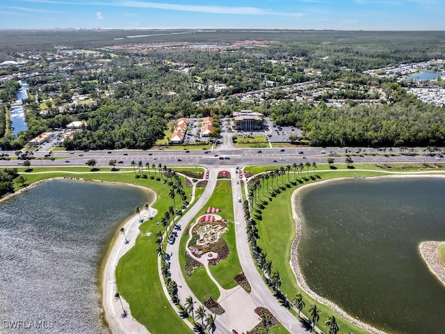 drone / aerial view with a water view