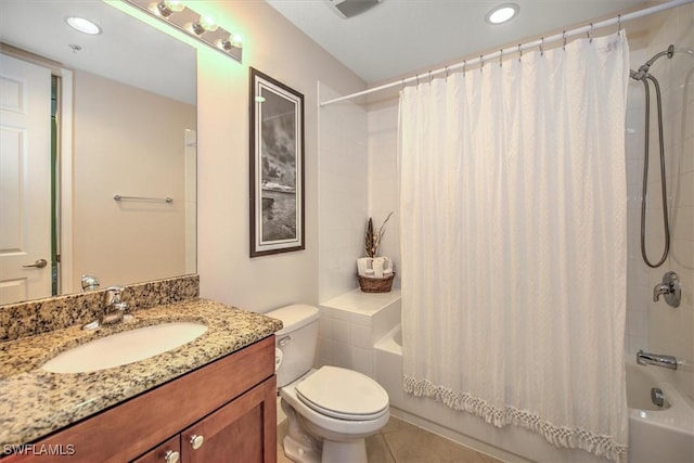 full bath featuring tile patterned flooring, shower / bath combination with curtain, toilet, and vanity