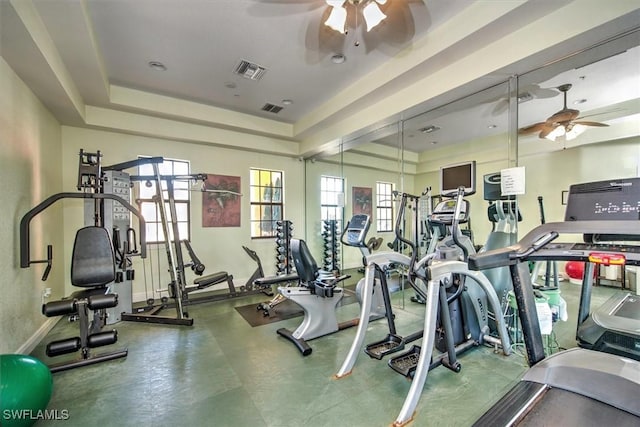 gym featuring visible vents, plenty of natural light, and a ceiling fan