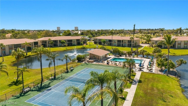 aerial view with a residential view and a water view