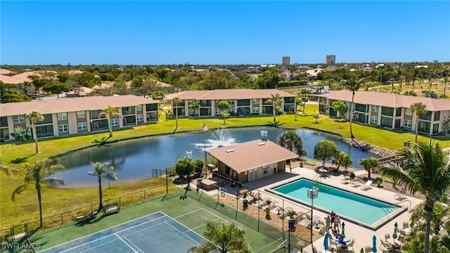 birds eye view of property featuring a residential view and a water view