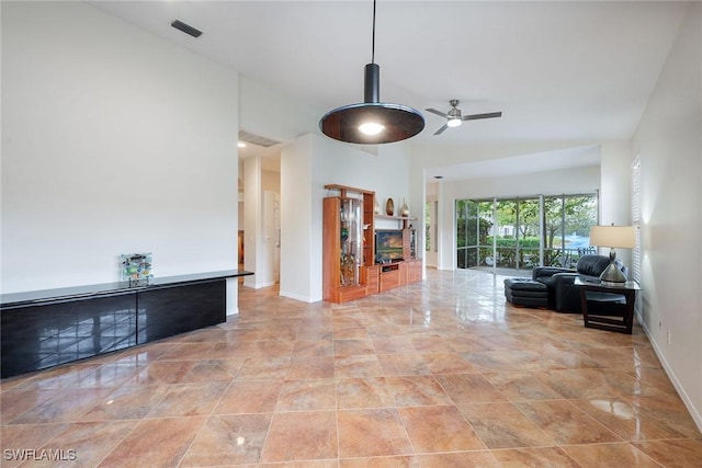 hallway with visible vents and baseboards