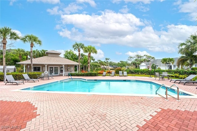 pool featuring a patio area and french doors