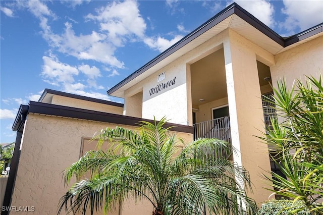 view of property exterior with stucco siding