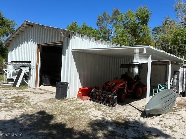 garage featuring a detached garage