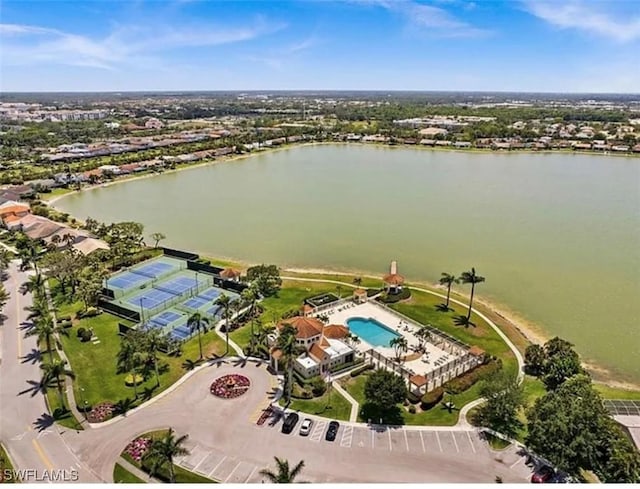 birds eye view of property featuring a water view