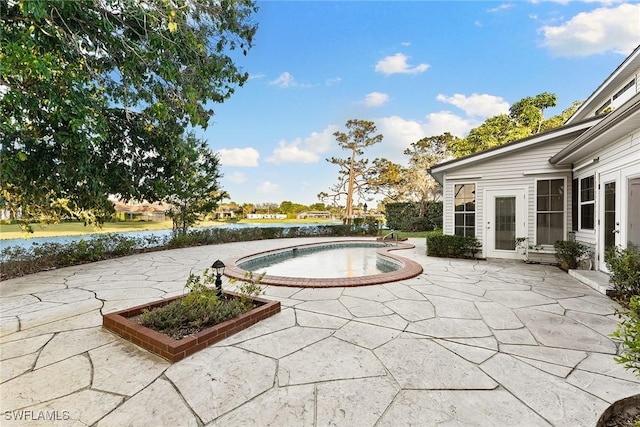 view of patio / terrace with an outdoor pool