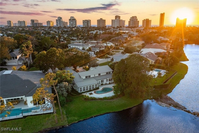 bird's eye view with a city view and a water view