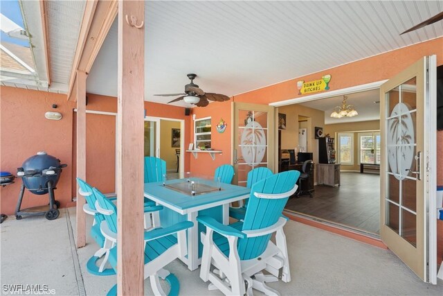 view of patio / terrace featuring area for grilling and a ceiling fan