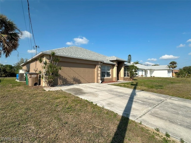 view of front facade with stucco siding, central air condition unit, a front lawn, concrete driveway, and a garage