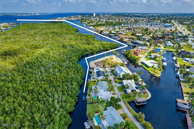 aerial view with a residential view and a water view