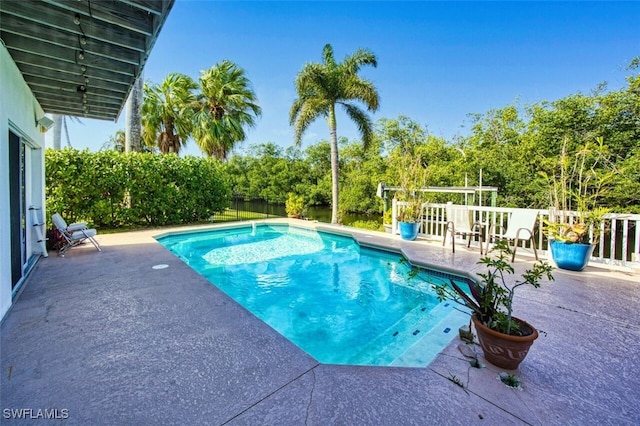 view of pool with a patio area and a fenced in pool