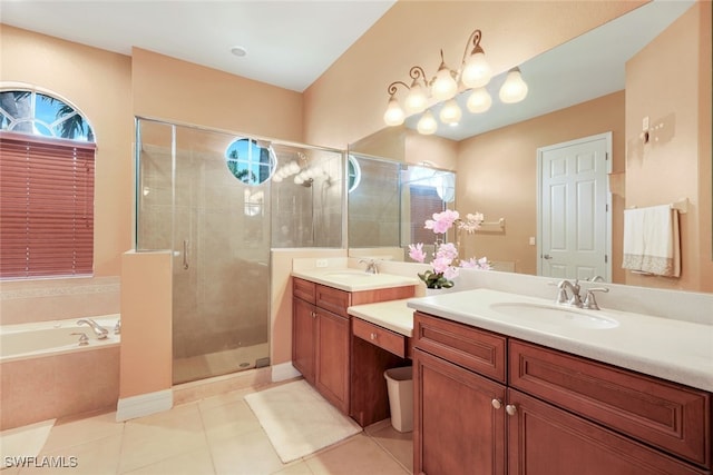 bathroom with vanity, a garden tub, a stall shower, and tile patterned flooring