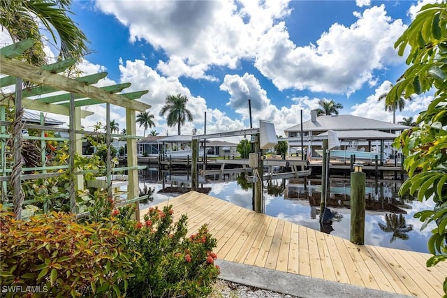 dock area featuring a water view and boat lift