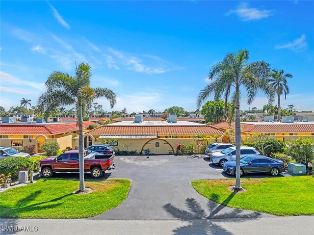 view of uncovered parking lot