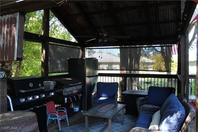 sunroom / solarium with ceiling fan