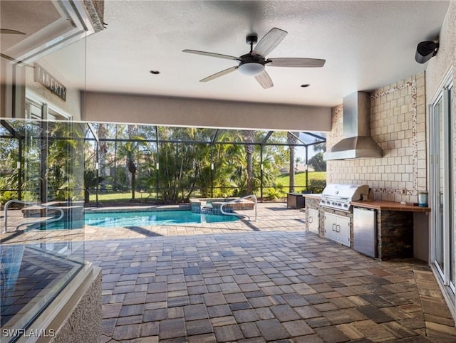 view of pool with glass enclosure, a patio area, area for grilling, a grill, and a ceiling fan