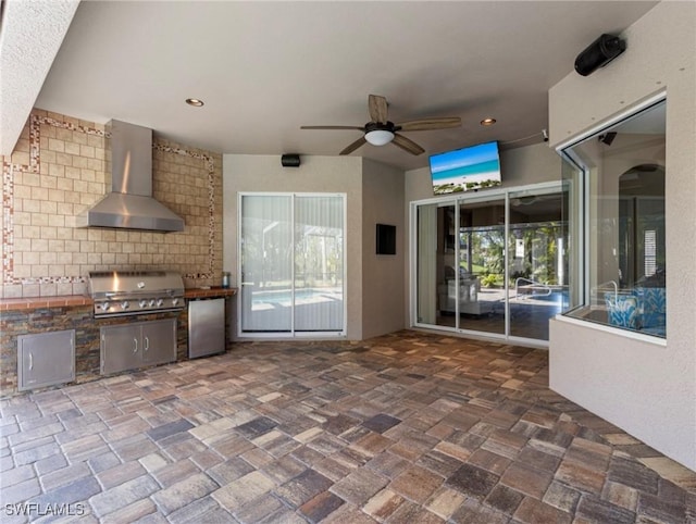 view of patio / terrace with grilling area, a ceiling fan, and area for grilling