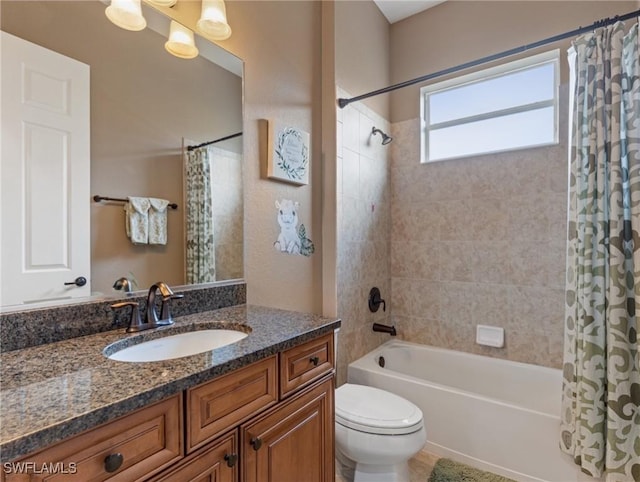 full bath with shower / bath combo with shower curtain, toilet, and vanity