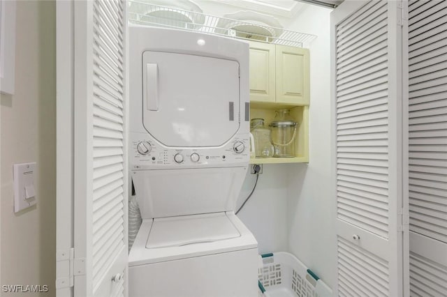 3643 N Rd, Naples, FL 34104 - laundry area with stacked washing maching and dryer and laundry area