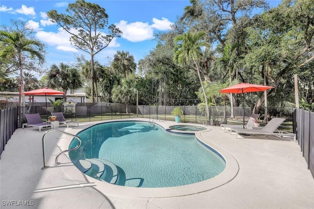 3643 N Rd, Naples, FL 34104 - view of pool with fence, a fenced in pool, a patio area, and an in ground hot tub