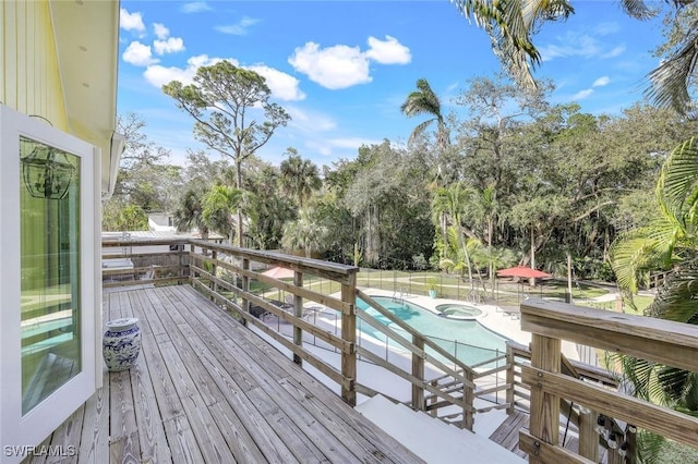 3643 N Rd, Naples, FL 34104 - wooden deck with a fenced in pool and an in ground hot tub