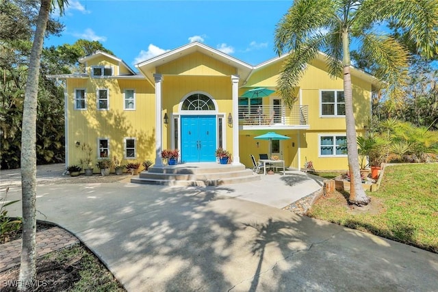 3643 N Rd, Naples, FL 34104 - view of front facade featuring a patio area