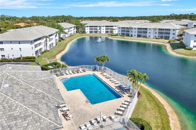 7831 Regal Heron Cir Unit 304, Naples, FL 34104 - view of pool featuring a water view