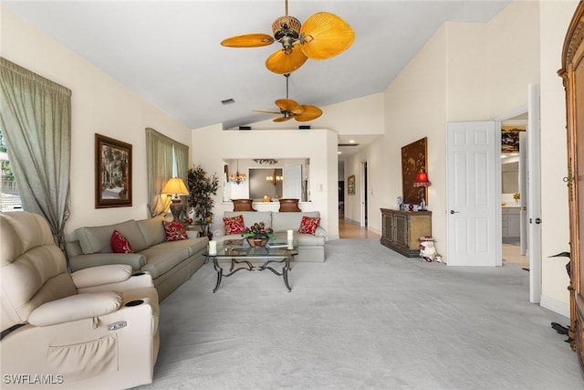 carpeted living room featuring high vaulted ceiling, visible vents, and ceiling fan