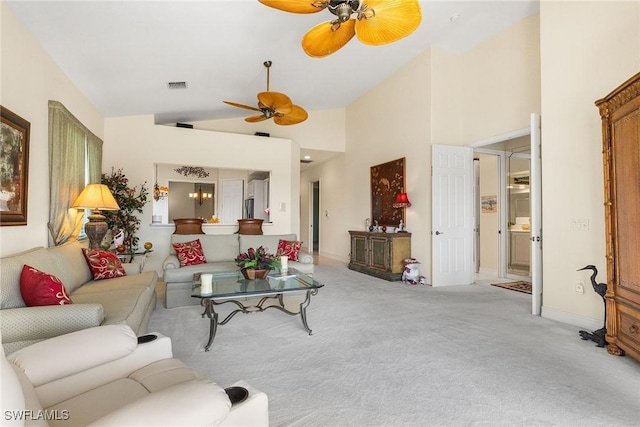 living room featuring visible vents, carpet flooring, high vaulted ceiling, and a ceiling fan