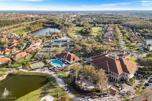 bird's eye view with a water view