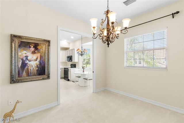 5979 Trophy Dr Unit 1604, Naples, FL 34110 - unfurnished dining area featuring a chandelier, light colored carpet, baseboards, and plenty of natural light