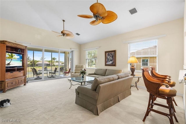 5979 Trophy Dr Unit 1604, Naples, FL 34110 - living room with light carpet, a ceiling fan, and high vaulted ceiling