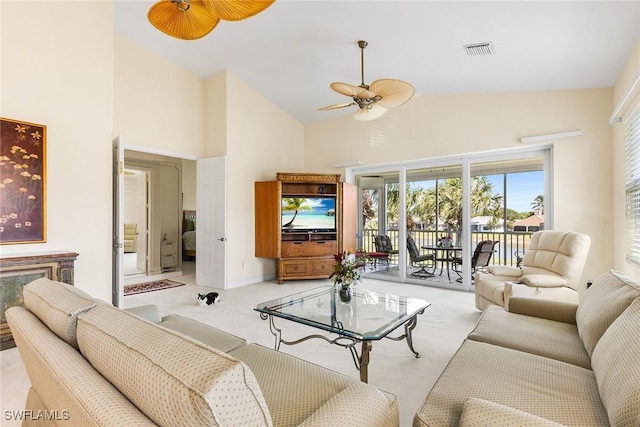 5979 Trophy Dr Unit 1604, Naples, FL 34110 - living area featuring ceiling fan, high vaulted ceiling, light colored carpet, and baseboards