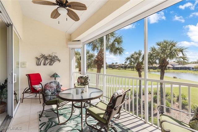 5979 Trophy Dr Unit 1604, Naples, FL 34110 - sunroom with a water view, ceiling fan, and lofted ceiling