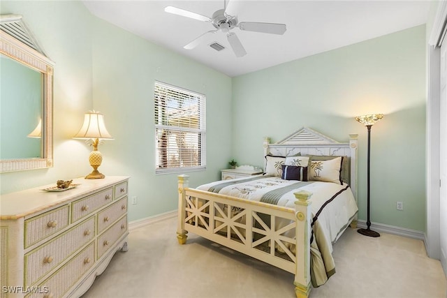 5979 Trophy Dr Unit 1604, Naples, FL 34110 - bedroom featuring light colored carpet, baseboards, and ceiling fan