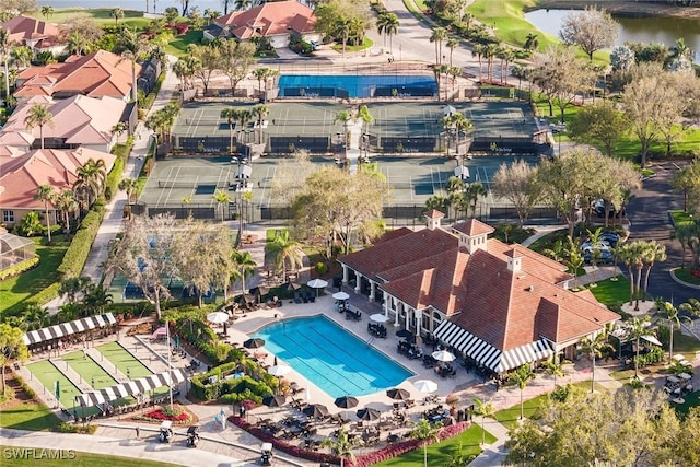 5979 Trophy Dr Unit 1604, Naples, FL 34110 - aerial view of property's location with a pool and a nearby body of water
