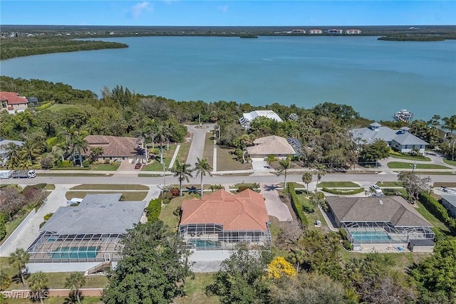 bird's eye view with a residential view and a water view