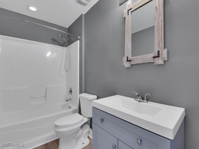 full bathroom with toilet, shower / washtub combination, and vanity