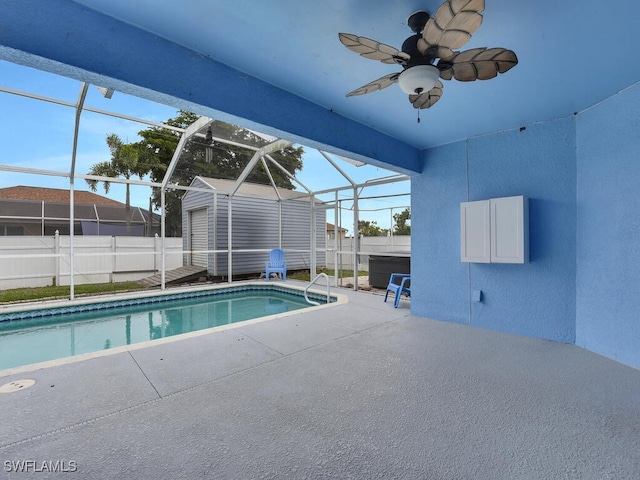 view of pool with a patio, fence, a fenced in pool, and a lanai