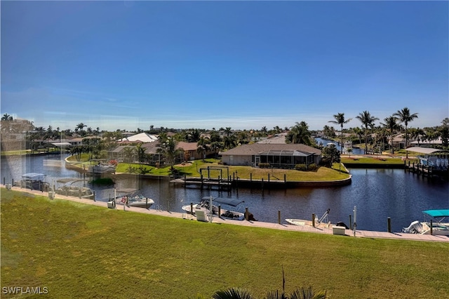 view of water feature featuring a dock and a residential view