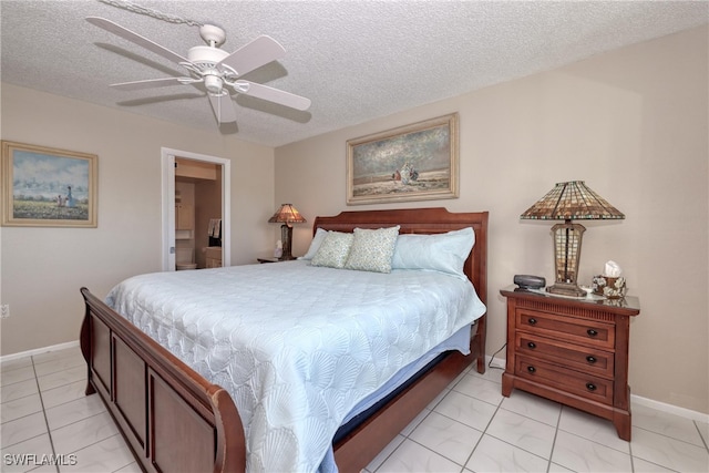 bedroom with a textured ceiling, baseboards, and a ceiling fan