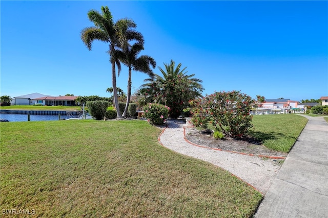 view of yard with a water view