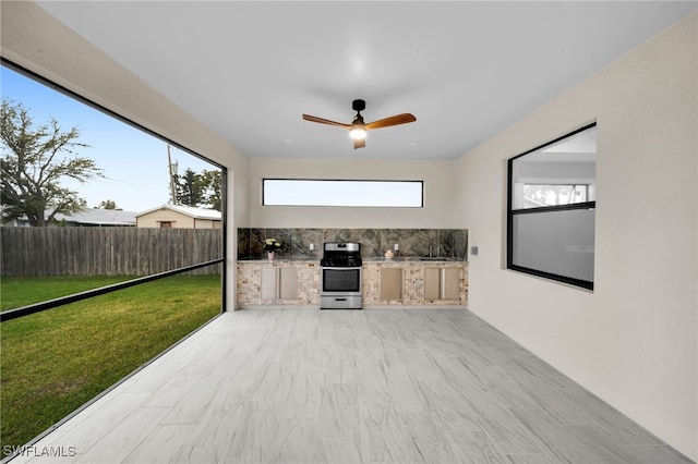 interior space featuring a ceiling fan